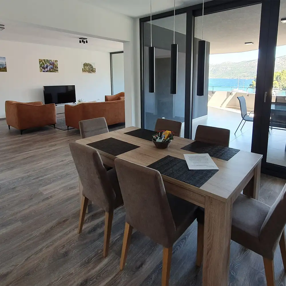 Modern livingroom with kitchen of the apartment