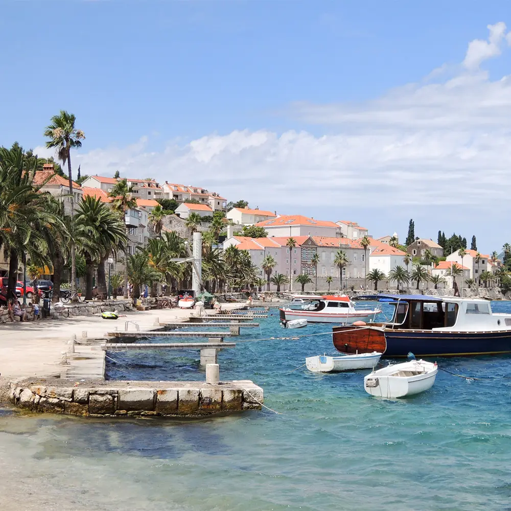 Old Town of Korčula with boats in the harbor