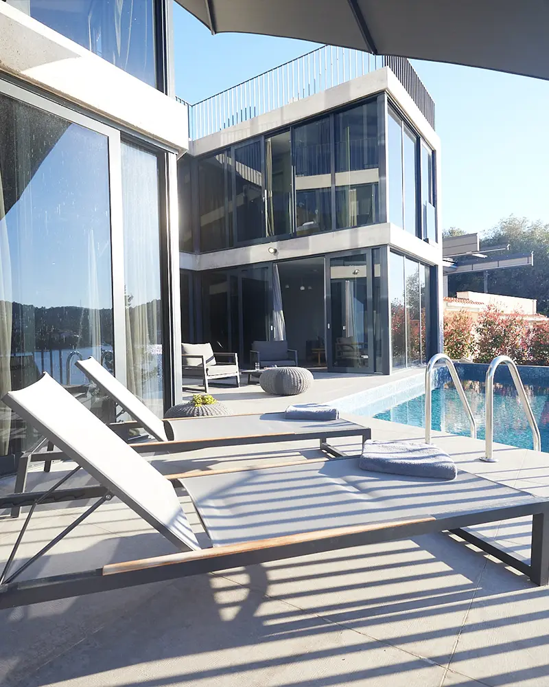 Terrace of the villa with sunbeds