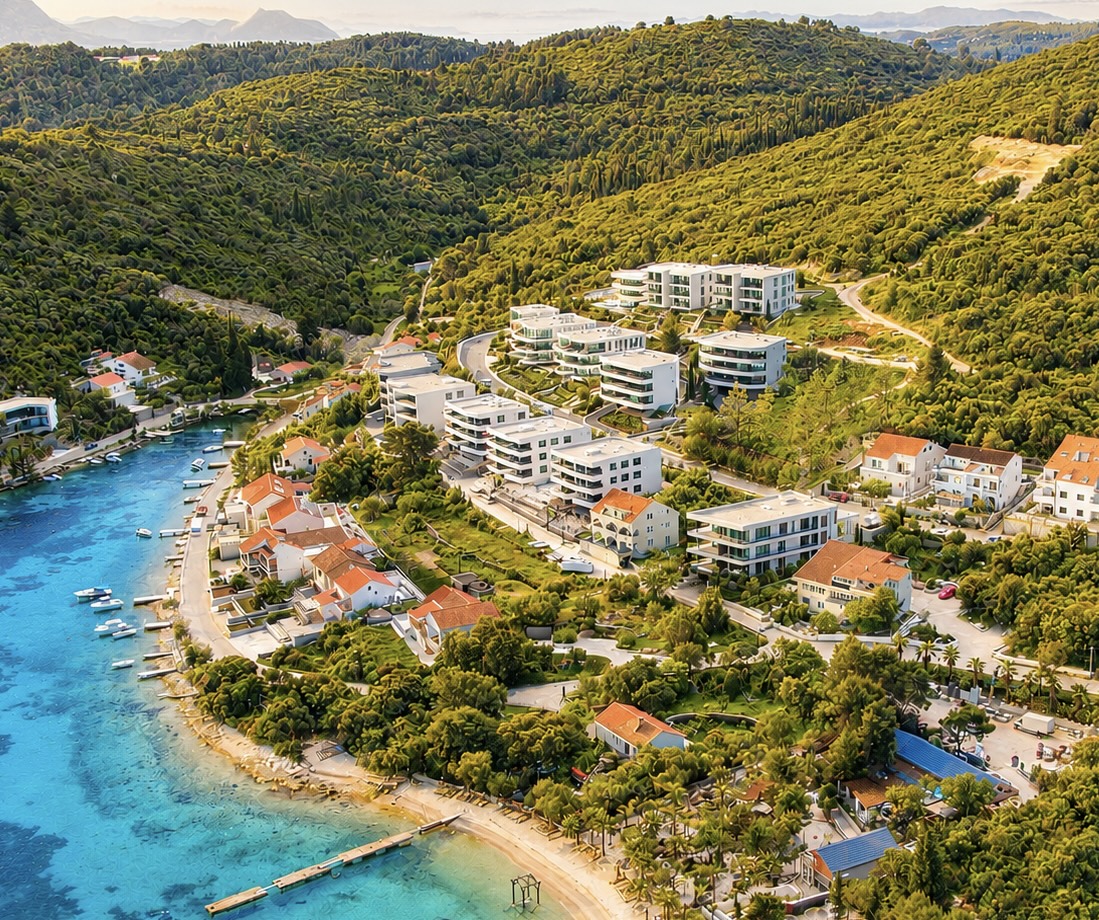The villa captured from above, set against turquoise waters